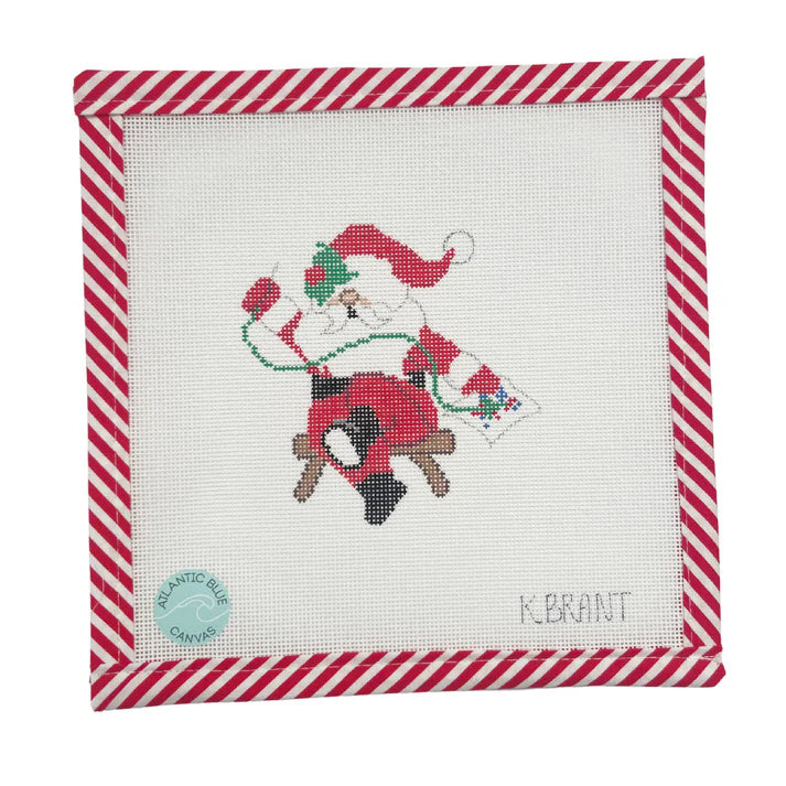 Needlepointing Santa